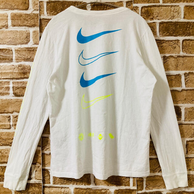 NIKE(ナイキ)の【美品】NIKE ナイキ　長袖　ロンt バックプリント　ロゴ多数　レディース レディースのトップス(Tシャツ(長袖/七分))の商品写真