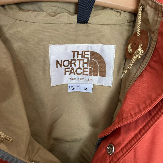 THE NORTH FACE(ザノースフェイス)のTHE NORTH FACE マウンテンパーカ 美品　M オレンジ 茶タグ メンズのジャケット/アウター(マウンテンパーカー)の商品写真