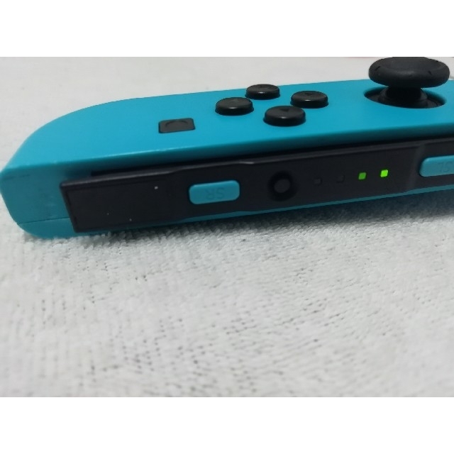 Nintendo Switch(ニンテンドースイッチ)の【ジャンク】Nintendo Switch Joy-Con ネオンブルー エンタメ/ホビーのゲームソフト/ゲーム機本体(家庭用ゲーム機本体)の商品写真