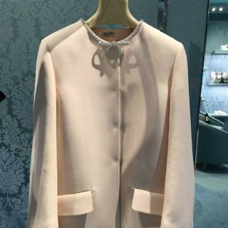 ミュウミュウ(miumiu)の未使用品　ミュウミュウ　クリスタル　リボンビジューコート　38サイズ(トレンチコート)