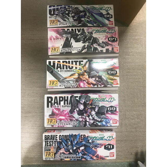 BANDAI(バンダイ)の【出品一時停止中】ガンプラ　ダブルオー劇場版セット エンタメ/ホビーのおもちゃ/ぬいぐるみ(模型/プラモデル)の商品写真