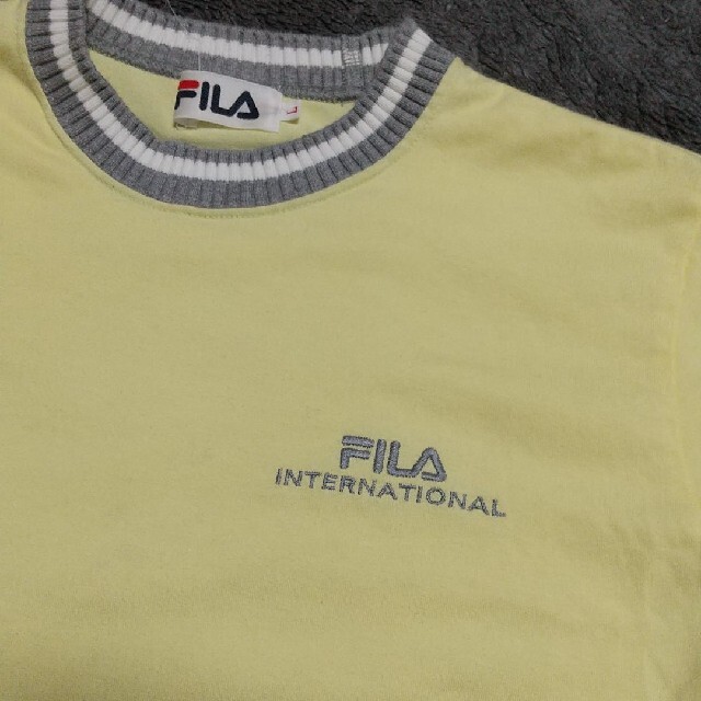 FILA(フィラ)の超美品FILAレディーススポーツウェアイエロー スポーツ/アウトドアのランニング(ウェア)の商品写真