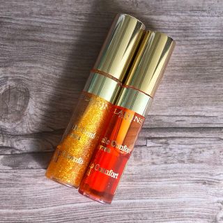 クラランス(CLARINS)のCLARINS コンフォートリップオイル05.07セット【ミニサイズ】(リップグロス)