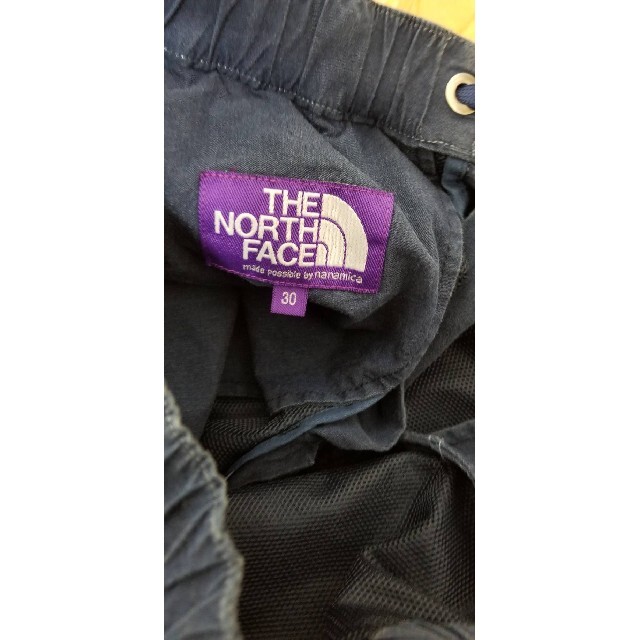 THE NORTH FACE(ザノースフェイス)のノースフェイスデニムインディゴマウンテンウィンドパンツ　S　新品タグ付き メンズのパンツ(デニム/ジーンズ)の商品写真