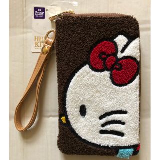 サンリオ(サンリオ)の新品・未使用　ハローキティ サガラ刺繍　スマホポーチ　ブラウン(ポーチ)