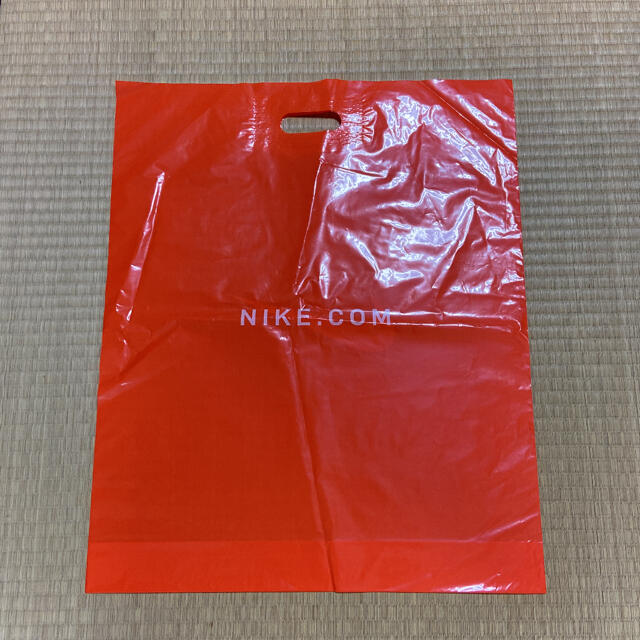 NIKE(ナイキ)のNIKE ショッパー　サイズ中　5枚セット　ビニール袋 レディースのバッグ(ショップ袋)の商品写真