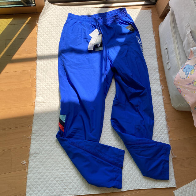 Kappa(カッパ)のXO青kappaメンズWINDPants スポーツ/アウトドアのサッカー/フットサル(ウェア)の商品写真