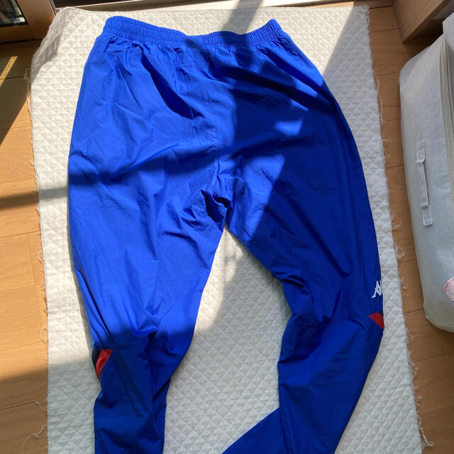 Kappa(カッパ)のXO青kappaメンズWINDPants スポーツ/アウトドアのサッカー/フットサル(ウェア)の商品写真