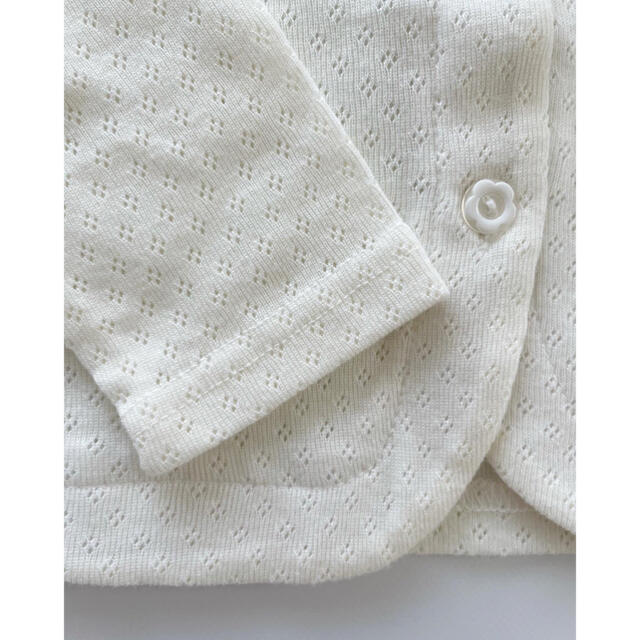 西松屋(ニシマツヤ)の西松屋 カーディガン 透かし編み 80 ホワイト 白 キッズ/ベビー/マタニティのベビー服(~85cm)(カーディガン/ボレロ)の商品写真