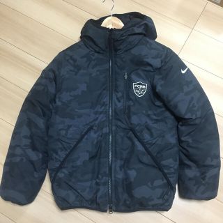 エフシーアールビー(F.C.R.B.)のfcrb nike 迷彩ダウンジャケット s(ダウンジャケット)