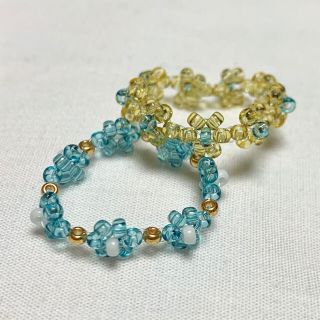 ディーホリック(dholic)のSALE‼️ハンドメイド　フラワービーズリング２点セット💙おまけリング付き(リング)