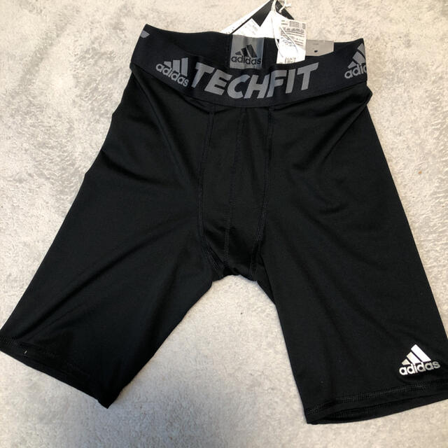 adidas(アディダス)のadidas アディダス　TECHFIT テックフィット　サイズO 新品付き スポーツ/アウトドアのサッカー/フットサル(ウェア)の商品写真