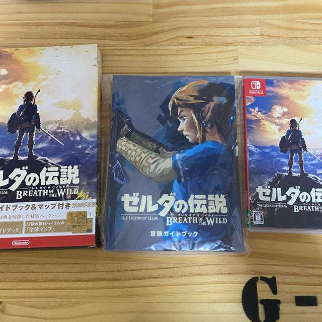 Nintendo Switch(ニンテンドースイッチ)のゼルダの伝説 ブレス オブ ザ ワイルド ～冒険ガイドブック＆マップ付き～（数量 エンタメ/ホビーのゲームソフト/ゲーム機本体(家庭用ゲームソフト)の商品写真