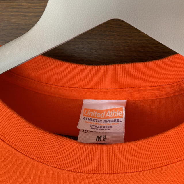 united athle Tシャツ バックプリント オレンジ メンズ Mサイズ メンズのトップス(Tシャツ/カットソー(半袖/袖なし))の商品写真