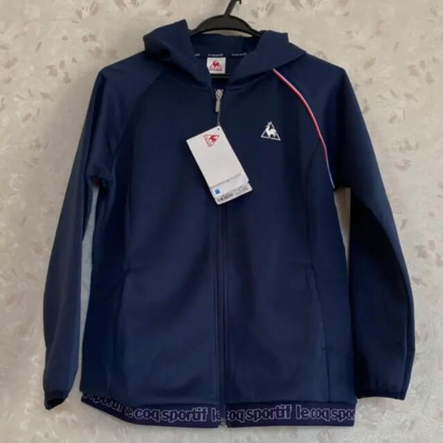 le coq sportif(ルコックスポルティフ)のle coq ☆ フーデッドフルジップ　レディースM新品 スポーツ/アウトドアのランニング(ウェア)の商品写真