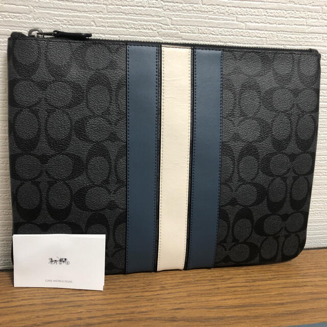 新品未使用】COACH コーチ ラージポーチ シグネチャーキャンバス