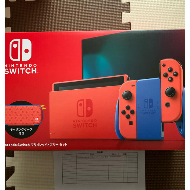 Nintendo Switch(ニンテンドースイッチ)のNintendo Switch 任天堂 スイッチ 本体 マリオレッド×ブルー エンタメ/ホビーのゲームソフト/ゲーム機本体(家庭用ゲーム機本体)の商品写真