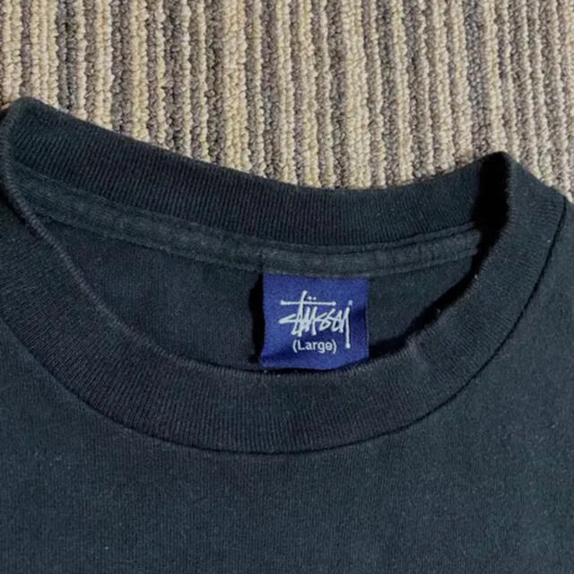 STUSSY(ステューシー)のステューシー・ワールドツアーSLICKTシャツ メンズのトップス(Tシャツ/カットソー(半袖/袖なし))の商品写真