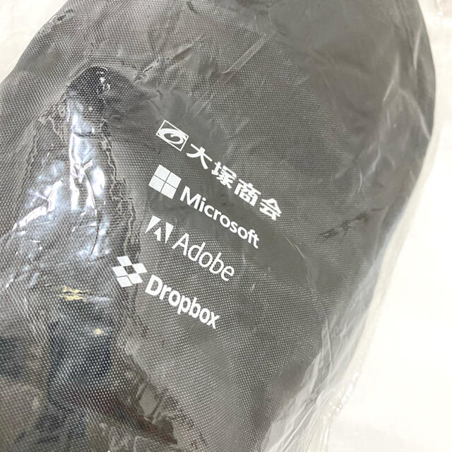 Microsoft(マイクロソフト)のすみれ☆さま専用　非売品　新品未使用　折り畳み傘ケース　大手IT企業ロゴ入り インテリア/住まい/日用品の日用品/生活雑貨/旅行(日用品/生活雑貨)の商品写真