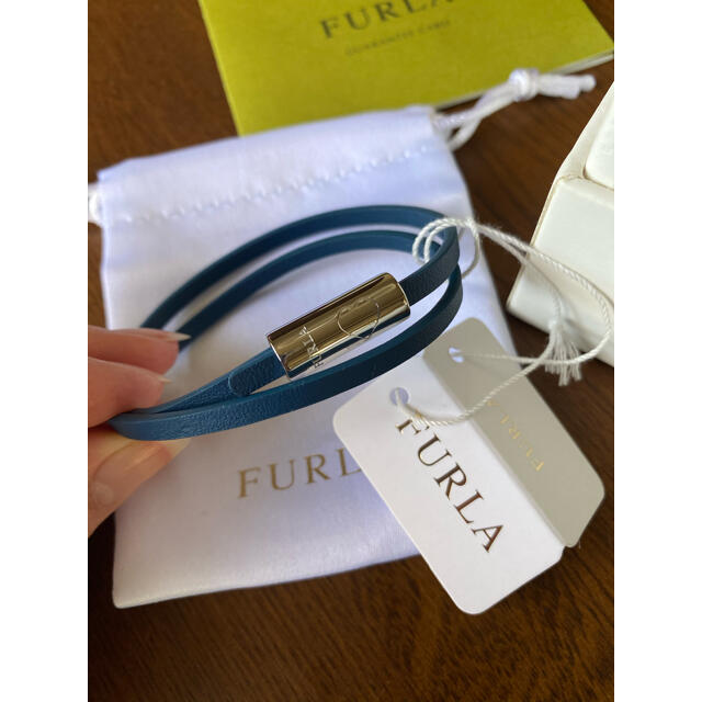 Furla(フルラ)の【GY様専用】　★FURLA ★ フルラ　腕時計　黒　金 レディースのファッション小物(腕時計)の商品写真
