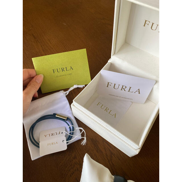 Furla(フルラ)の【GY様専用】　★FURLA ★ フルラ　腕時計　黒　金 レディースのファッション小物(腕時計)の商品写真