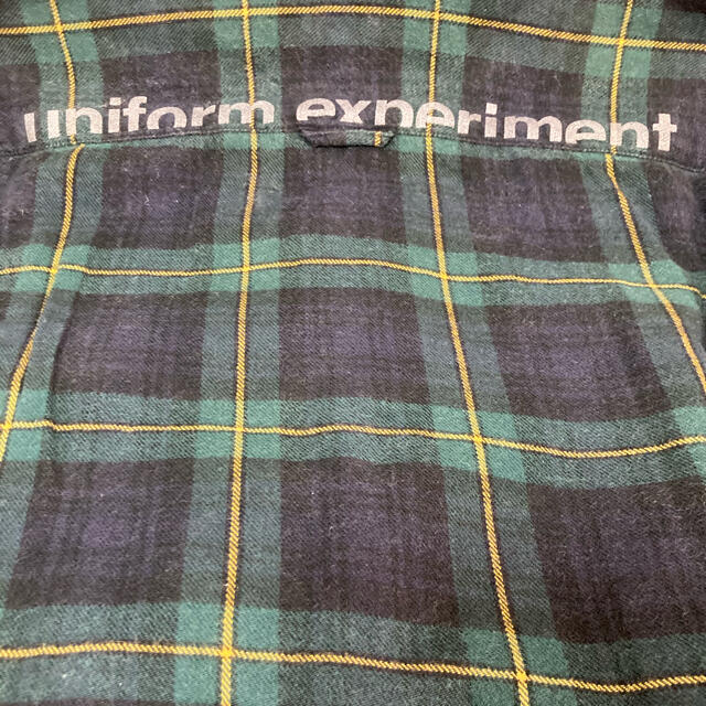 uniform experiment(ユニフォームエクスペリメント)のUE BACK PRINT FLANNEL CHECK B.D SHIRT メンズのトップス(シャツ)の商品写真