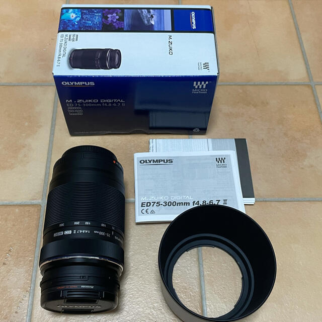 OLYMPUS(オリンパス)のオリンパス　75-300mm f4.8-6.7 Ⅱ プロテクター、純正フード スマホ/家電/カメラのカメラ(レンズ(ズーム))の商品写真
