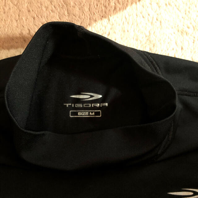 TIGORA(ティゴラ)のアンダーシャツ 長袖(黒) スポーツ/アウトドアの野球(ウェア)の商品写真
