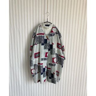 サンタモニカ(Santa Monica)の古着　総柄シャツ　レトロ　ヴィンテージ  ユーズド     ポリシャツ (シャツ/ブラウス(半袖/袖なし))