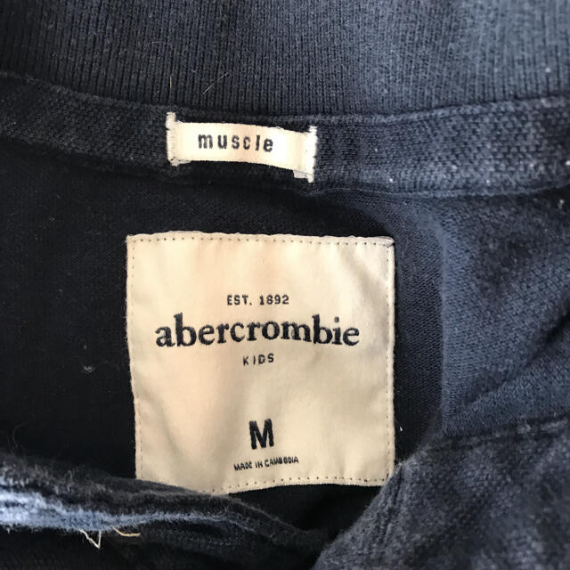 Abercrombie&Fitch(アバクロンビーアンドフィッチ)のアバクロ　紺　ポロシャツ レディースのトップス(ポロシャツ)の商品写真