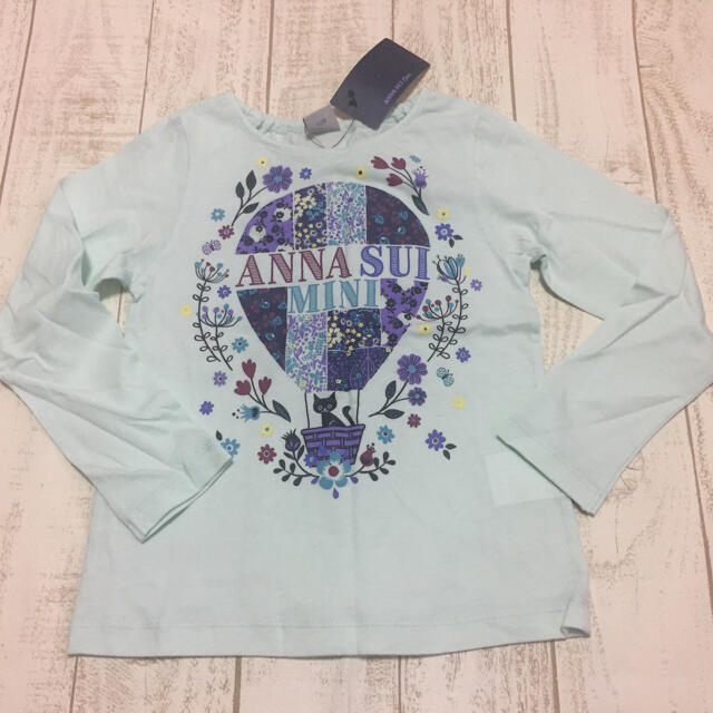 ANNA SUI mini(アナスイミニ)のアナスイミニ ネコ気球花プリントTシャツ 120  エメラルドグリーン 新品 キッズ/ベビー/マタニティのキッズ服女の子用(90cm~)(Tシャツ/カットソー)の商品写真