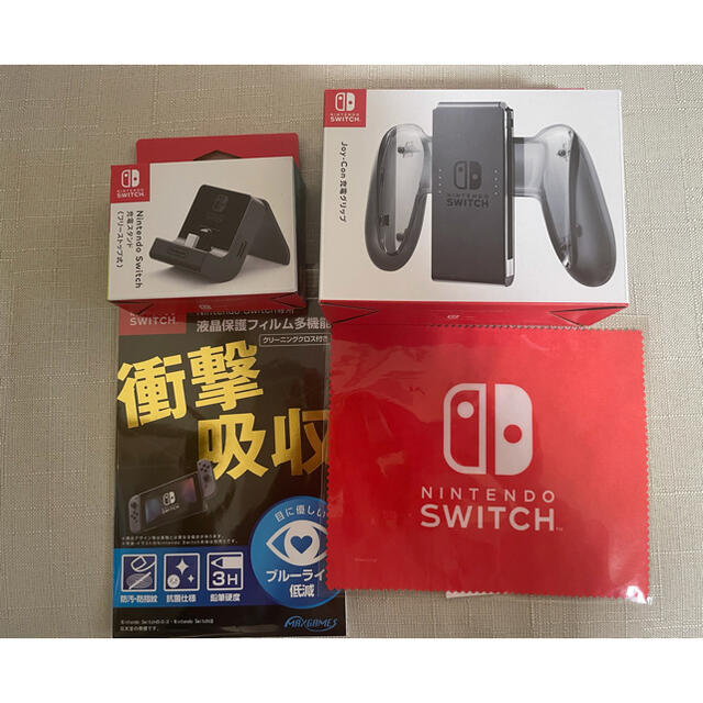 Nintendo Switch(ニンテンドースイッチ)の新品未開封switch液晶保護フィルム&Joy-Con充電グリップ&充電スタンド エンタメ/ホビーのゲームソフト/ゲーム機本体(その他)の商品写真