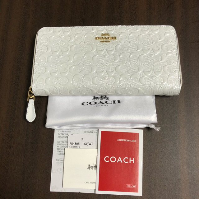 即日発送【coach】エンボスドシグネチャーラウンドジップ 　白エナメル　長財布