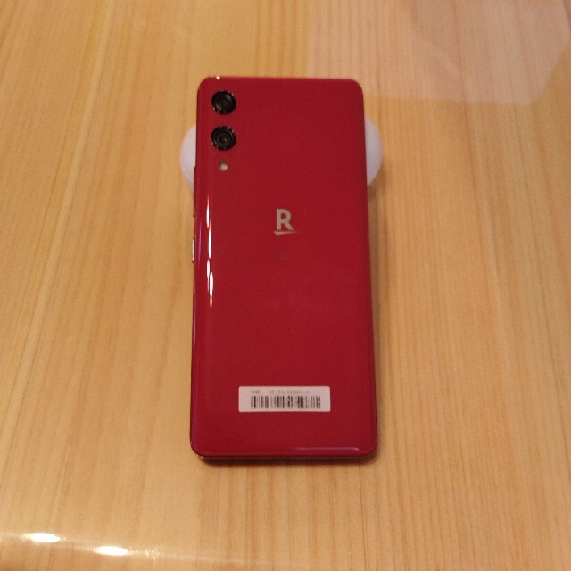 Rakuten(ラクテン)の【ほぼ新品】Rakuten Hand 赤（おまけのケース付） スマホ/家電/カメラのスマートフォン/携帯電話(スマートフォン本体)の商品写真