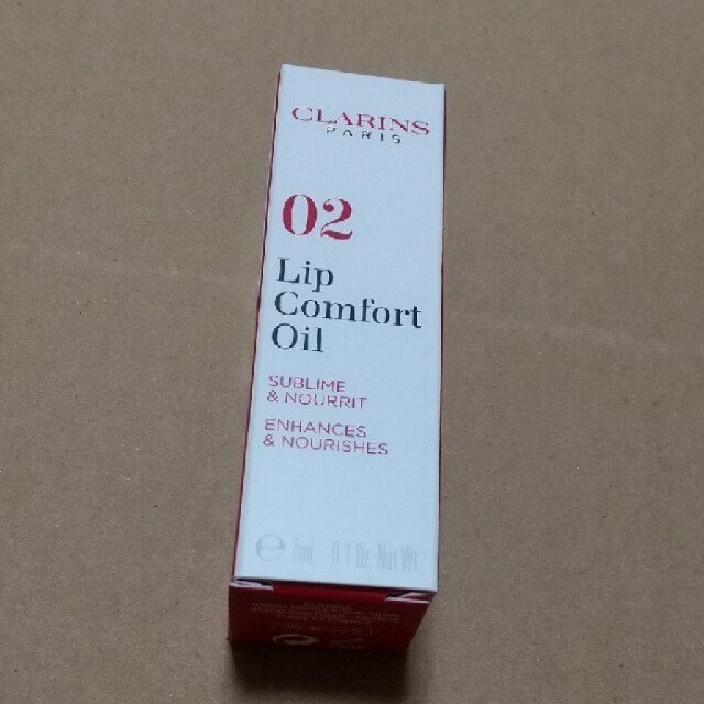 CLARINS(クラランス)の新品未使用品クラランス コンフォート リップオイル02 ラズベリー 7mL コスメ/美容のベースメイク/化粧品(リップグロス)の商品写真