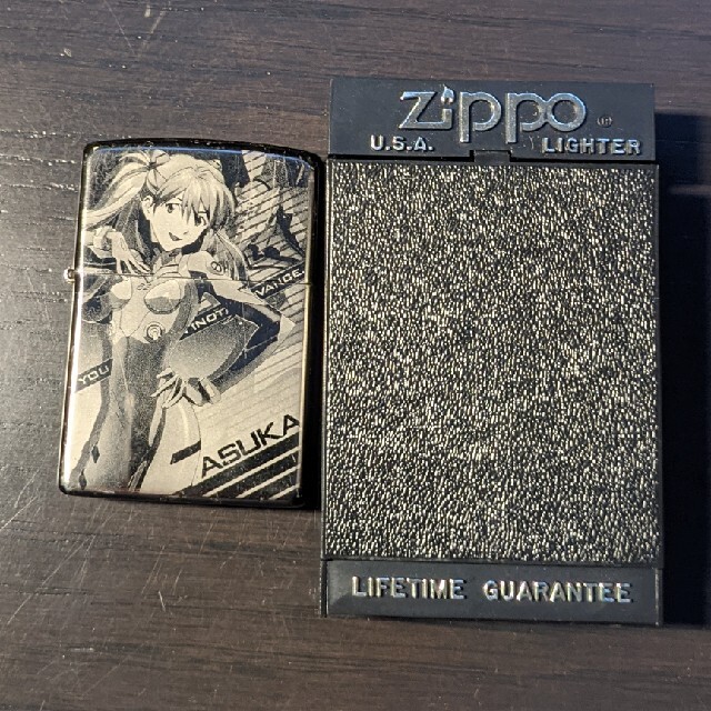 ZIPPO(ジッポー)のエヴァンゲリオン zippo  アスカ　ジャンク品 メンズのファッション小物(タバコグッズ)の商品写真