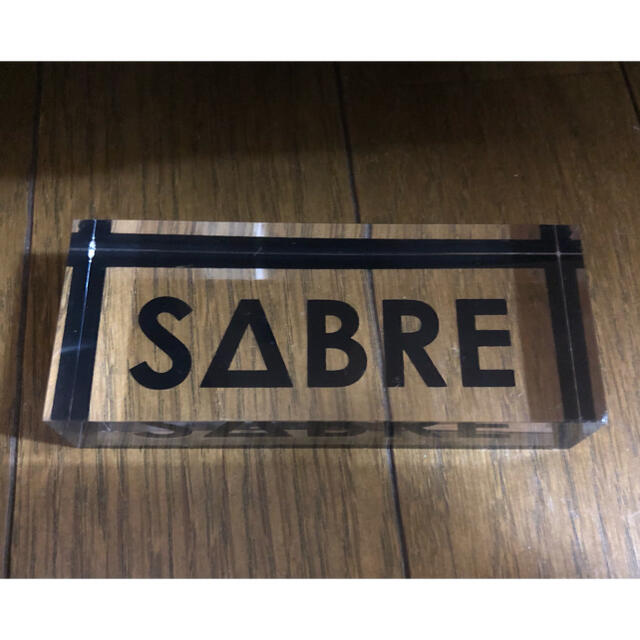 SABRE(セイバー)のSABRE（セイバー）ネームプレート　クリア　非売品 メンズのファッション小物(サングラス/メガネ)の商品写真