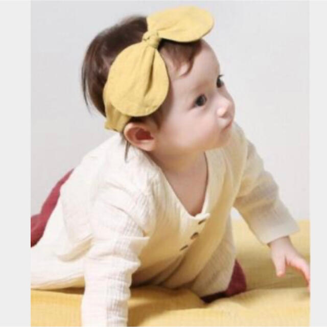 リボンヘアバンドイエロー キッズ/ベビー/マタニティのこども用ファッション小物(その他)の商品写真