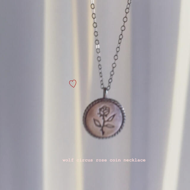 wolf circus rose coin necklace