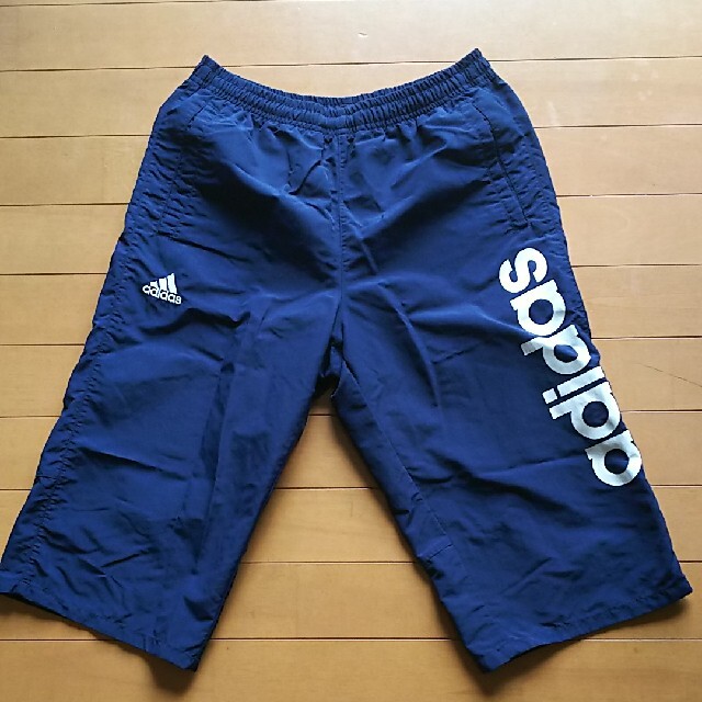 adidas(アディダス)の【adidas】ナイロンパンツ(ネイビー)(160㎝) キッズ/ベビー/マタニティのキッズ服男の子用(90cm~)(パンツ/スパッツ)の商品写真