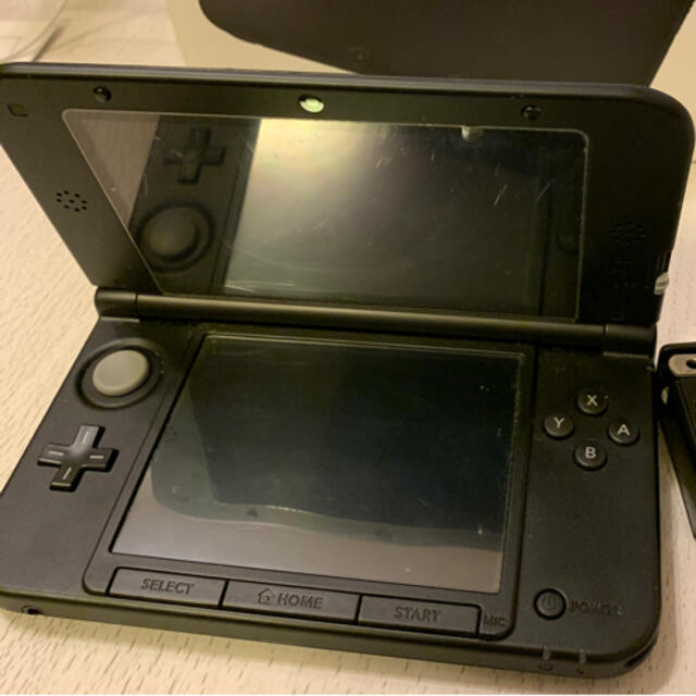 ニンテンドー3DS(ニンテンドー3DS)の【美品】Nintendo 3DS  LL 本体ブラック　＆ 充電器 エンタメ/ホビーのゲームソフト/ゲーム機本体(携帯用ゲーム機本体)の商品写真