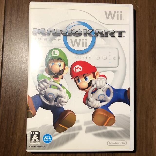 任天堂(ニンテンドウ)のマリオカートWii  Wiiハンドルセット エンタメ/ホビーのゲームソフト/ゲーム機本体(家庭用ゲームソフト)の商品写真