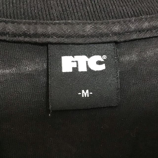 FTC(エフティーシー)のFTC エフティーシー　Tシャツ　バックプリント　M 胸ワンポイント　ブラック メンズのトップス(Tシャツ/カットソー(半袖/袖なし))の商品写真