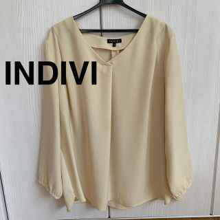 インディヴィ(INDIVI)の【美品！】INDIVI レモンイエロートップス(カットソー(長袖/七分))