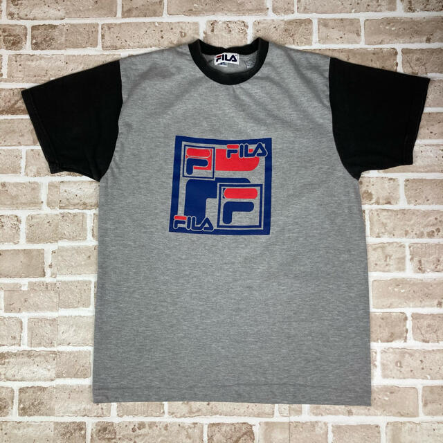 FILA(フィラ)のFILA フィラ Tシャツ 袖切り替え 古着 M グレー×ブラック メンズのトップス(Tシャツ/カットソー(半袖/袖なし))の商品写真