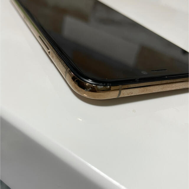 Apple(アップル)のiPhone XS 64GB  ゴールド スマホ/家電/カメラのスマートフォン/携帯電話(スマートフォン本体)の商品写真