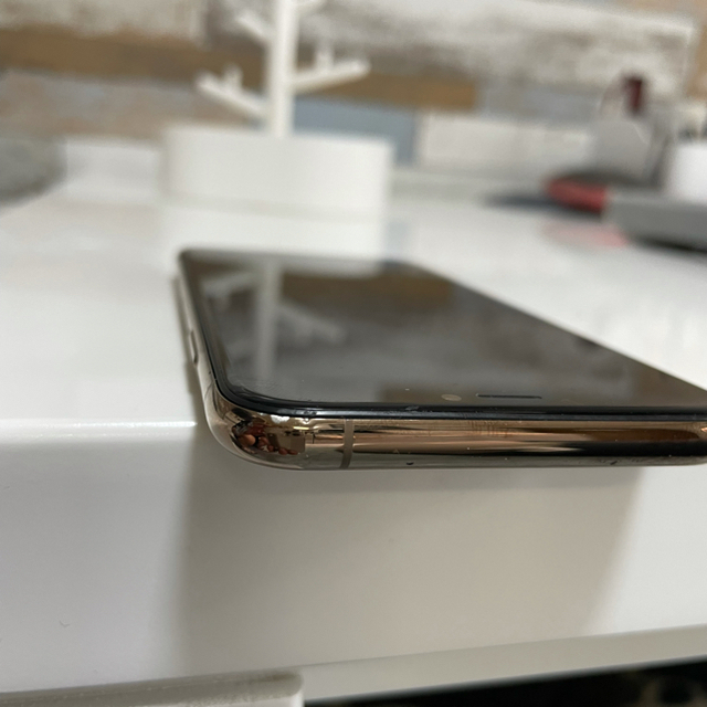 Apple(アップル)のiPhone XS 64GB  ゴールド スマホ/家電/カメラのスマートフォン/携帯電話(スマートフォン本体)の商品写真