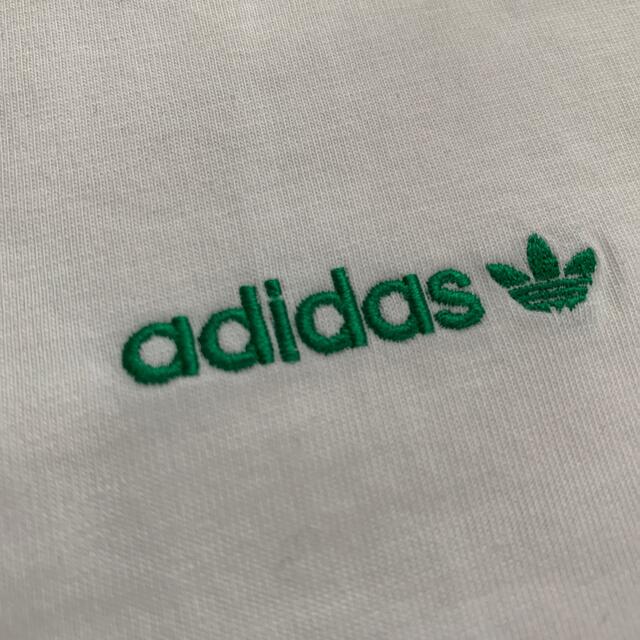 adidas(アディダス)のアディダス　リニア　ロゴ　リピート　トレフォイル　白　Tシャツ　L メンズのトップス(Tシャツ/カットソー(半袖/袖なし))の商品写真