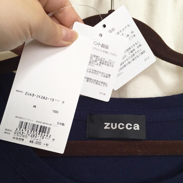 ZUCCa(ズッカ)のZUCCa  クラウンプリント ロゴTシャツ ネイビー M 新品未使用 レディースのトップス(Tシャツ(半袖/袖なし))の商品写真