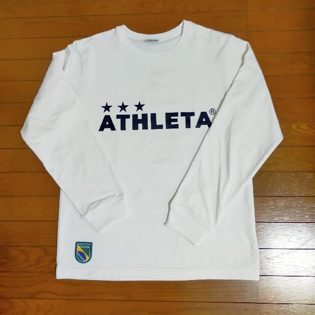 ATHLETA(アスレタ)の送料込み☆中古☆ATHLETA☆アスレタ☆長袖Tシャツ☆M スポーツ/アウトドアのサッカー/フットサル(ウェア)の商品写真